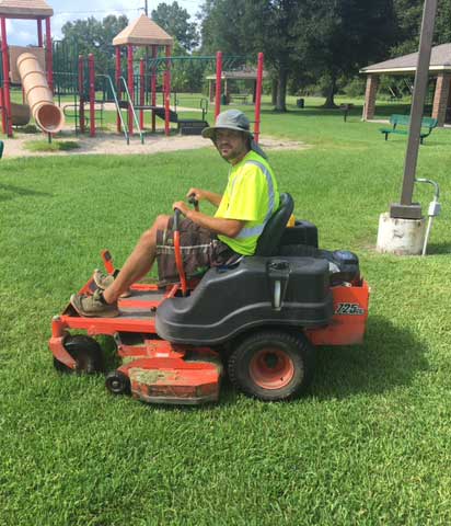 High MTC crew finishing a commercial lawn mowing job.